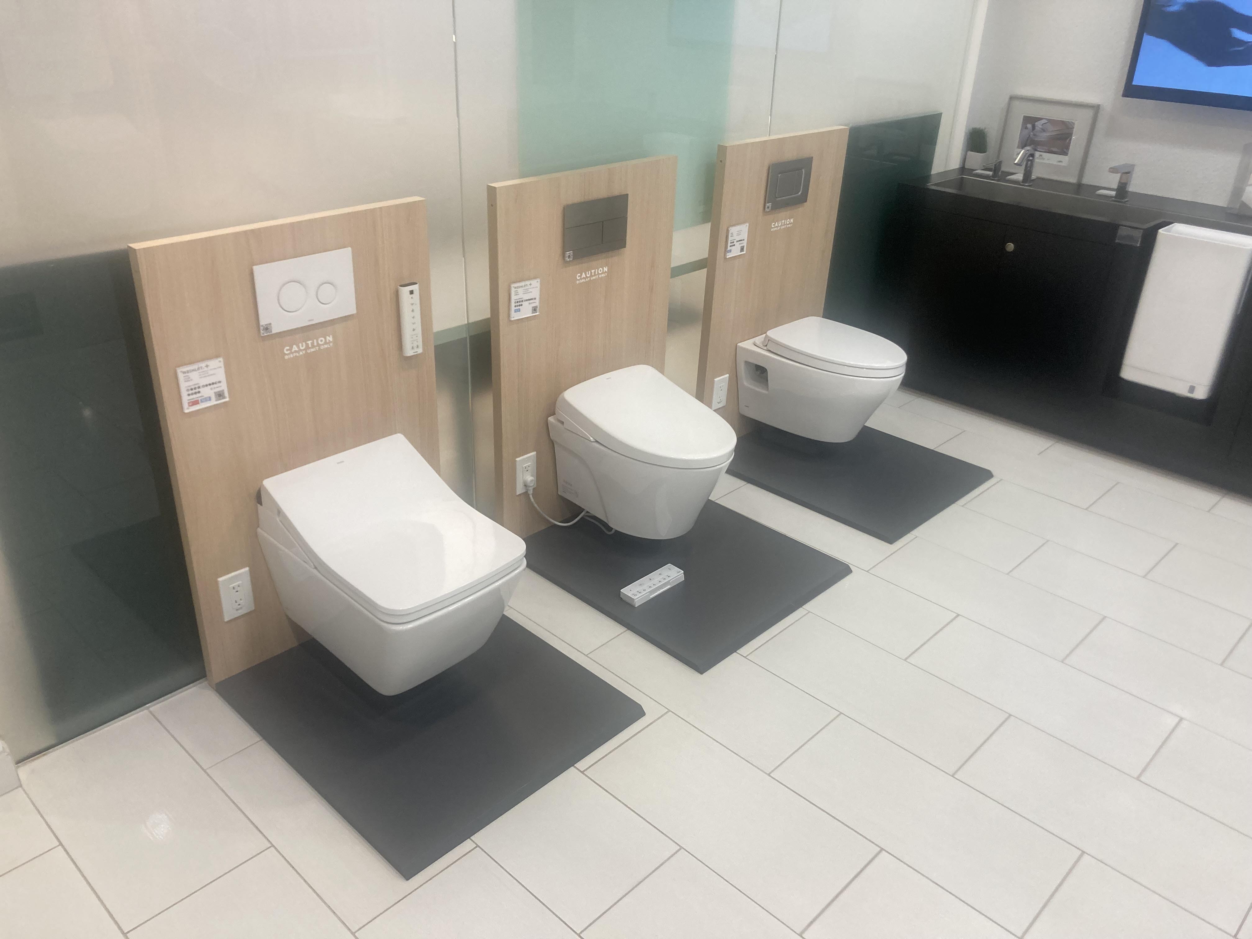 Wall-hung toilets on display